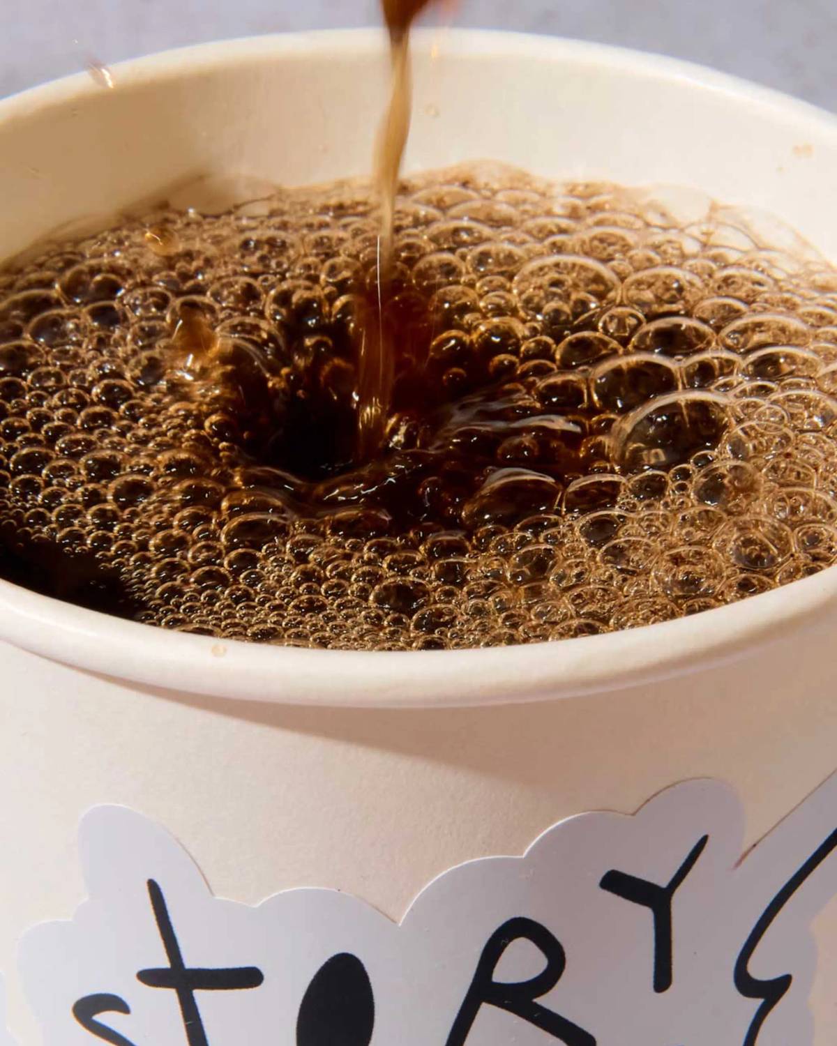 Story Horse: Takeaway cup close-up